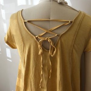Soft yellow lace up back tee